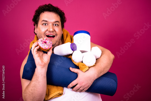 Diet and healthy lifestyle. Funny fat man and sweet donuts. photo