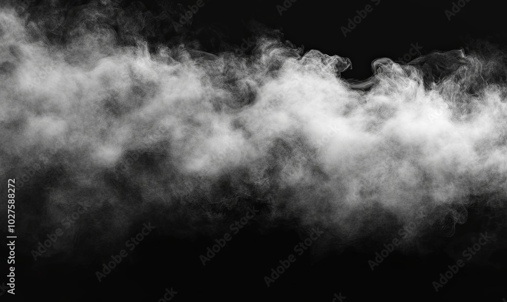 A cloud of smoke or fog against a black background, perfect for compositing or overlaying. A cloud of smoke or fog against a black background, perfect for compositing or overlaying.