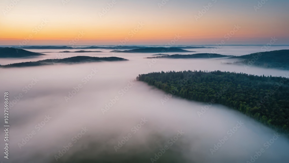 A breathtaking aerial view of islands covered in dense forest, surrounded by thick layers of fog floating over a serene lake. The mist blankets the valleys between the hills, creating a surreal, other A breathtaking aerial view of islands covered in dense forest, surrounded by thick layers of fog floating over a serene lake. The mist blankets the valleys between the hills, creating a surreal, other