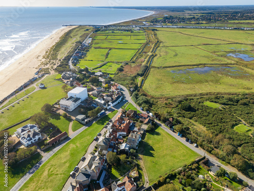 Aerial view of the famous Suffolk coastal town of Southwold. Georgian houses can be seen as well as the golden beach looking out to the North Sea. photo