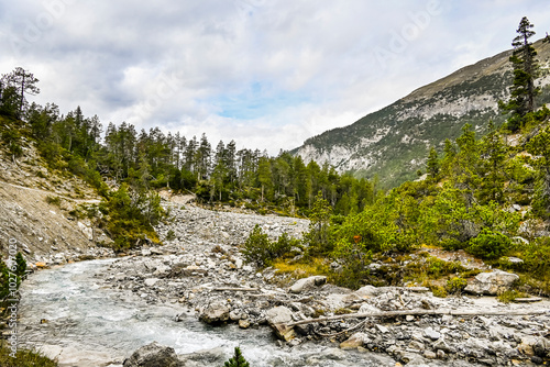 Zernez, Ofenpass, Bach, Ova dal Fuorn, Wanderweg, Uferweg, Passstrasse, Engadin, Nationalpark, Alpen, Herbst, Herbstfarben, Graubünden, Schweiz photo