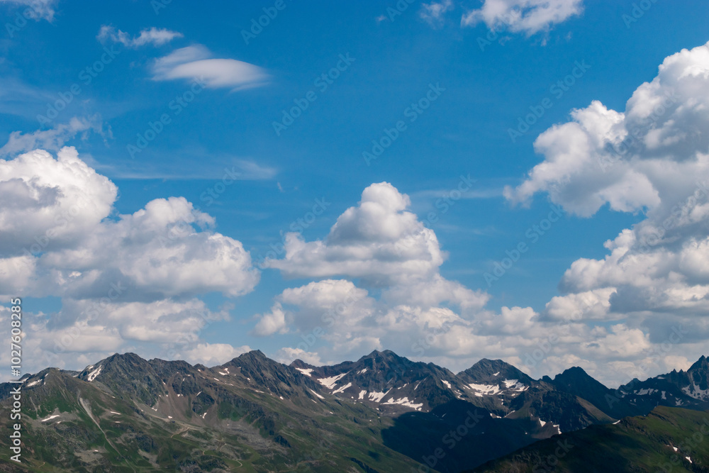 Fototapeta premium Fantastic alpine scenery at the Arlberg pass in Austria seen from a small plane