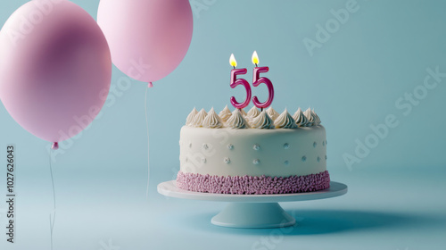 Birthday cake with candles for 55 years, balloons in pastel background