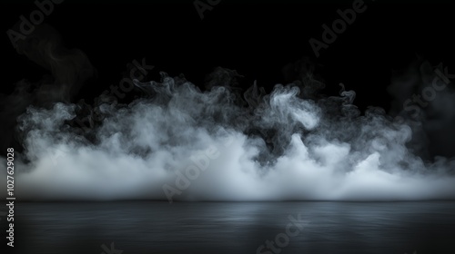 Mystical mist. Swirling smoke in dark and light symphony. Fluid fantasia. Abstract dance of fog and light on floor with black background