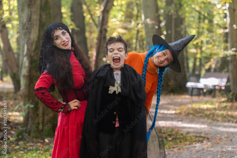 halloween in autumn forest, orange sweater, witch in striped stockings, teenager, boy dracula, red, funny witch, halloween, day of the dead holiday, dressed up witch halloween in autumn forest, orange sweater, witch in striped stockings, teenager, boy dracula, red, funny witch, halloween, day of the dead holiday, dressed up witch