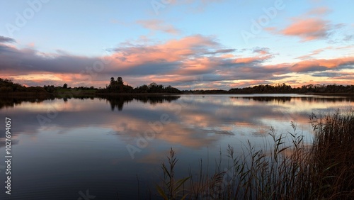 Obraz na płótnie Beautiful orange sunset lakeside landscape scenery at Ross lake, Roscahill, Galway, Ireland, nature background w salonie