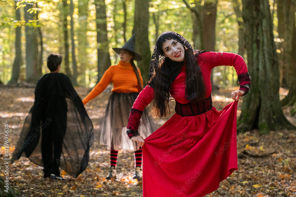 halloween in autumn forest, orange sweater, witch in striped stockings, teenager, boy dracula, red, funny witch, halloween, day of the dead holiday, dressed up witch halloween in autumn forest, orange sweater, witch in striped stockings, teenager, boy dracula, red, funny witch, halloween, day of the dead holiday, dressed up witch