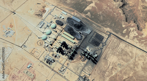 Tableau sur toile The landscape of a sandy desert and an oil plant in Qatar from a bird's eye view
