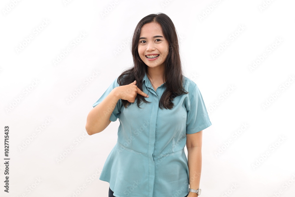 Happy smiling Asian woman points at herself, confident satisfied expression, models over white background Happy smiling Asian woman points at herself, confident satisfied expression, models over white background