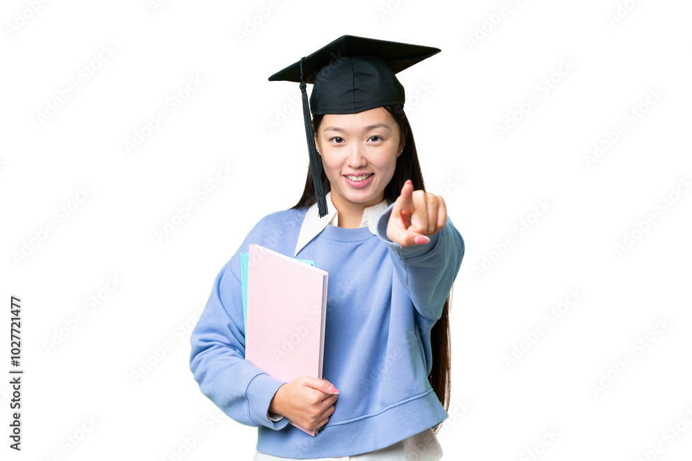 Young student woman over isolated chroma key background pointing front with happy expression Young student woman over isolated chroma key background pointing front with happy expression