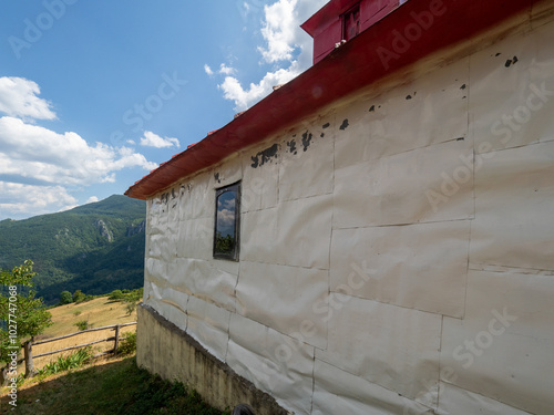 Church at the isolated Scarisoara hamlet, Romania photo