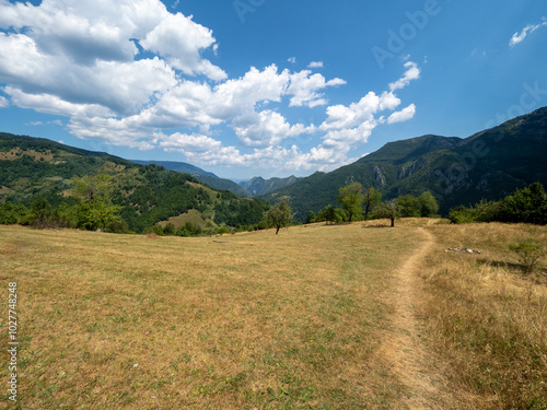 The trail to Inelet and Scarisoara hamlets, Romania photo