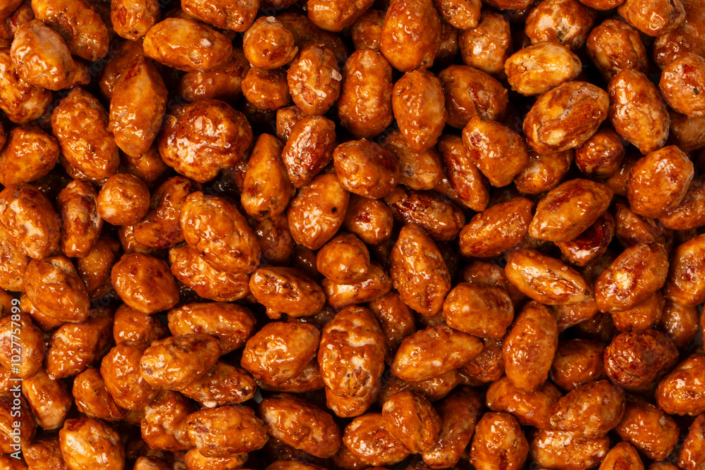 Tasty sweet roasted peanuts as a background. Tasty sweet roasted peanuts as a background.