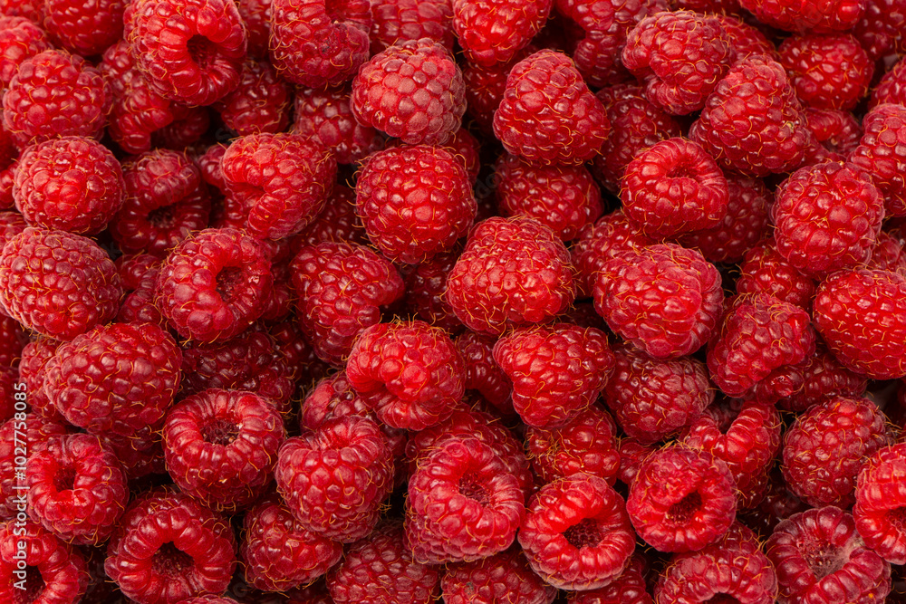 Tasty fresh raspberry as a background. Tasty fresh raspberry as a background.