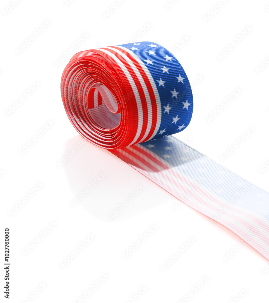 Obraz premium Roll with ribbon in colors of American flag isolated on white
