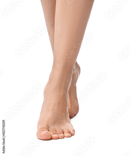 Barefoot woman on white background, closeup view