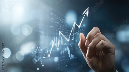 Successful business concept with a hand drawing an upward arrow on a transparent screen