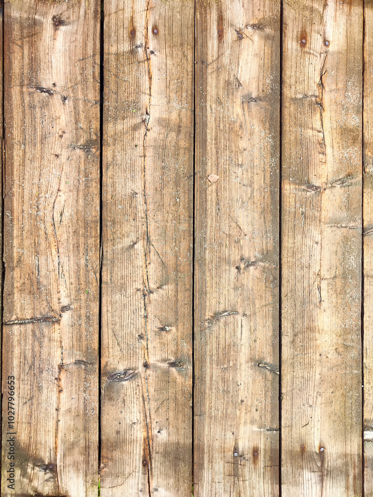 Rustic wooden planks with a natural grain pattern showcasing a weathered texture in soft earth tones Rustic wooden planks with a natural grain pattern showcasing a weathered texture in soft earth tones