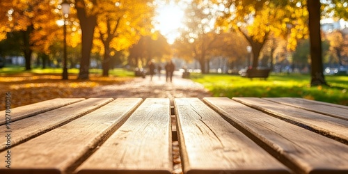 Wooden picnic table in a park with autumn leaves