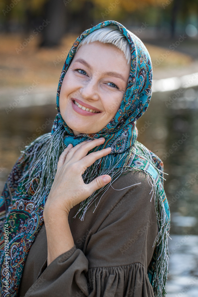 Russian beauty - young beautiful woman in a traditional headscarf Russian beauty - young beautiful woman in a traditional headscarf