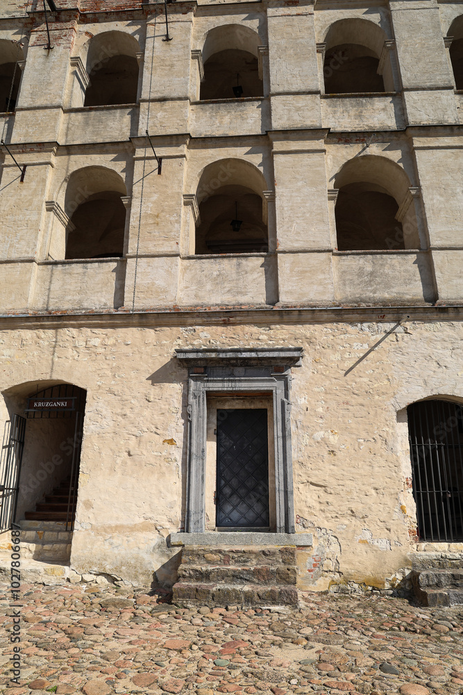 Old Castle Entrance with Arched Windows.Historic Fortress with Stone Steps Old Castle Entrance with Arched Windows.Historic Fortress with Stone Steps