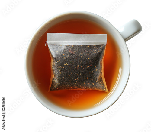 Brewing a warm cup of tea with a steeping bag in a cozy ceramic mug at home