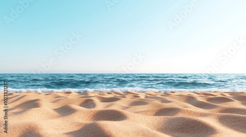 Beach with gentle waves and clear sky