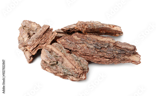 Pieces of tree bark on white background