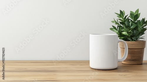 Coffee mug and plant on wooden table