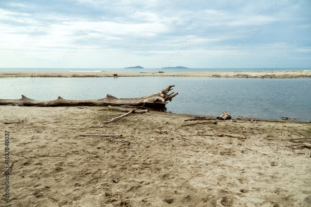 Little lake front a ocean near of Cayos Cochinos, Honduras. Tourism concept. Little lake front a ocean near of Cayos Cochinos, Honduras. Tourism concept.
