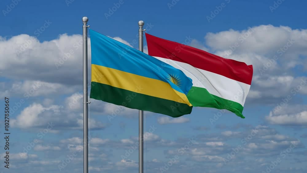 Hungary and Rwanda flags flying together, video concept of the relationship, two country relations concept Hungary and Rwanda flags flying together, video concept of the relationship, two country relations concept