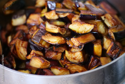 Obraz na płótnie Eggplant cubes fried to make eggplant stew, w salonie