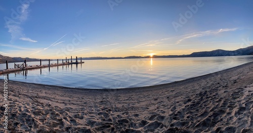 Serene Lake and Mountain Landscapes at Sunrise and Sunset