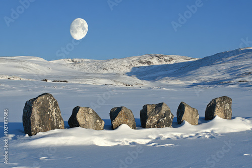 Stone Circle under Full Moon in Snowy Landscape photo