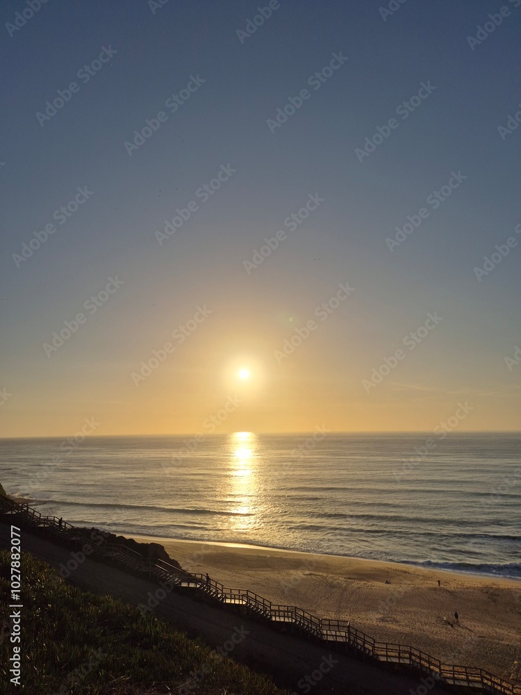 Sunset Over the Beach: A Serene Moment Captured by the Ocean Sunset Over the Beach: A Serene Moment Captured by the Ocean
