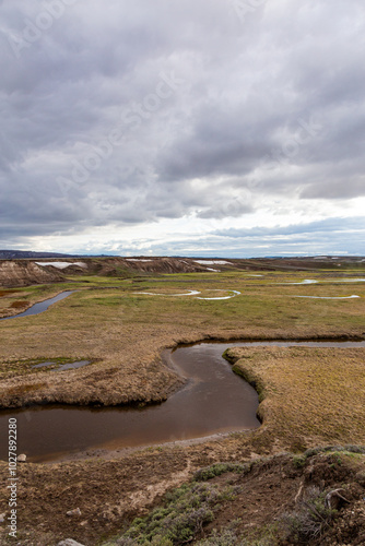 Dramatic Skies Over Rolling Landscape in Yellowstone National Park