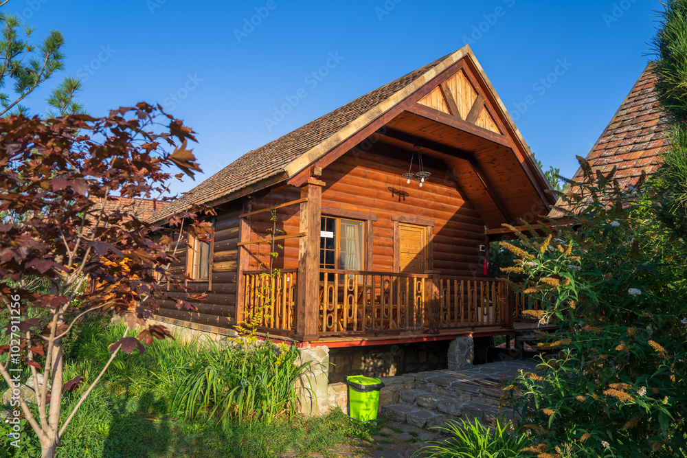 Wooden hotel cabin in the forest Wooden hotel cabin in the forest