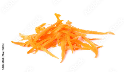 Pile of fresh grated carrot isolated on white photo