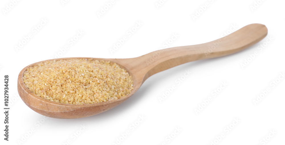 Spoon with raw wheat groats isolated on white Spoon with raw wheat groats isolated on white
