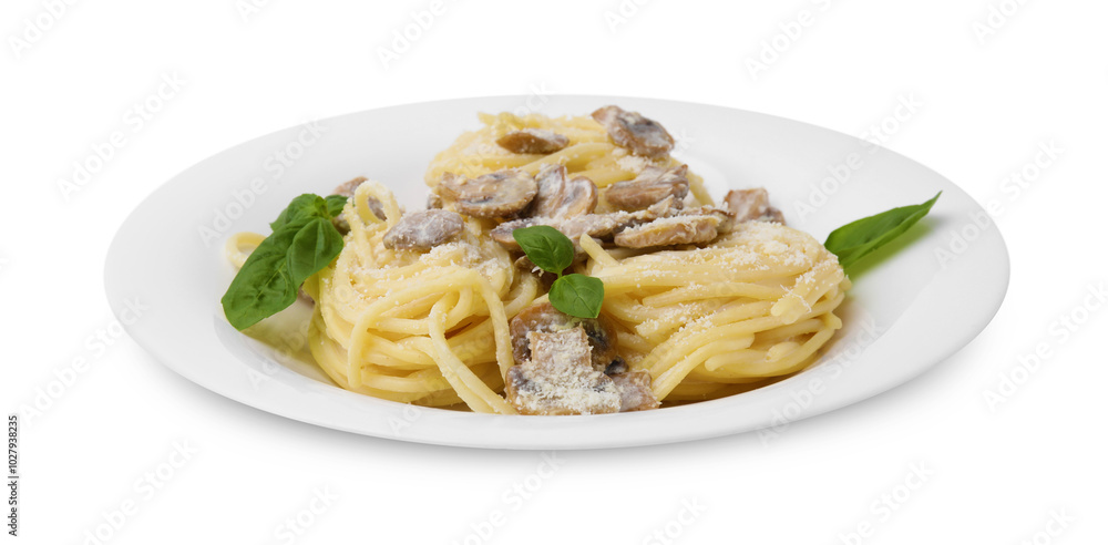 Delicious pasta with mushrooms and basil isolated on white Delicious pasta with mushrooms and basil isolated on white