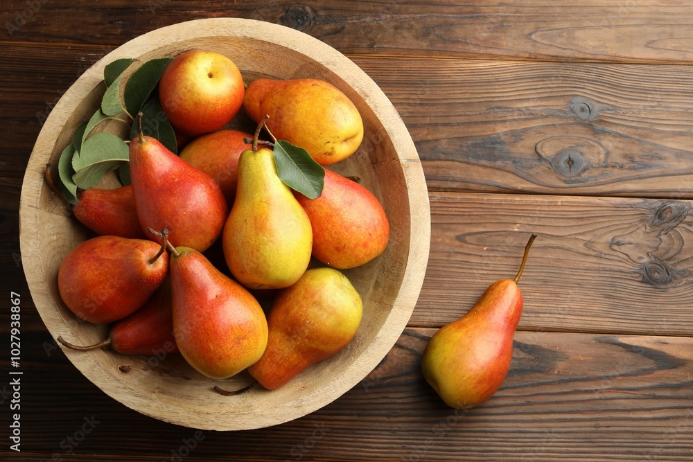 Ripe juicy pears on wooden table, top view Ripe juicy pears on wooden table, top view