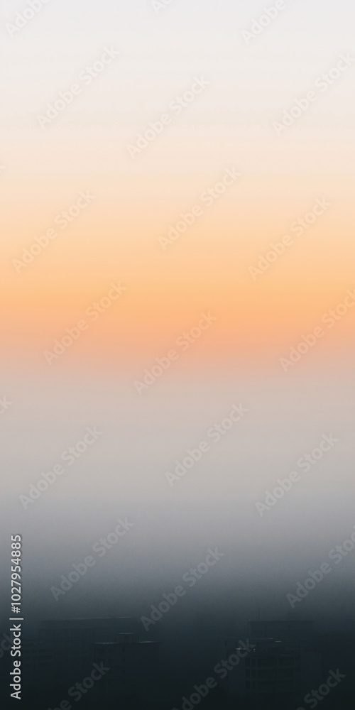 Stunning gradient sunset over the city, with vibrant hues blending through misty clouds, creating a serene and atmospheric landscape, perfect for minimalist mobile phone wallpapers Stunning gradient sunset over the city, with vibrant hues blending through misty clouds, creating a serene and atmospheric landscape, perfect for minimalist mobile phone wallpapers