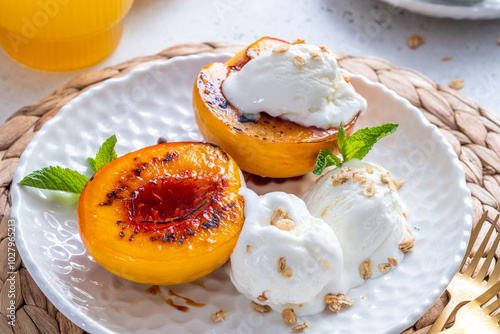 Grilled peaches with honey drizzle, served with vanilla ice cream