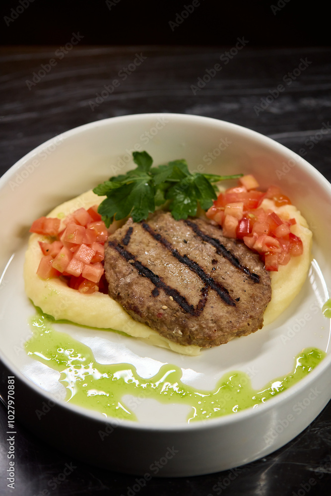 Savor a Grilled Steak served with Tomato Salsa and Green Sauce, beautifully presented Savor a Grilled Steak served with Tomato Salsa and Green Sauce, beautifully presented