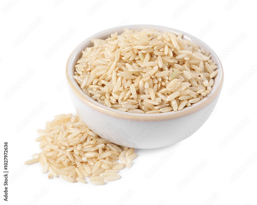 Raw rice in bowl isolated on white Raw rice in bowl isolated on white