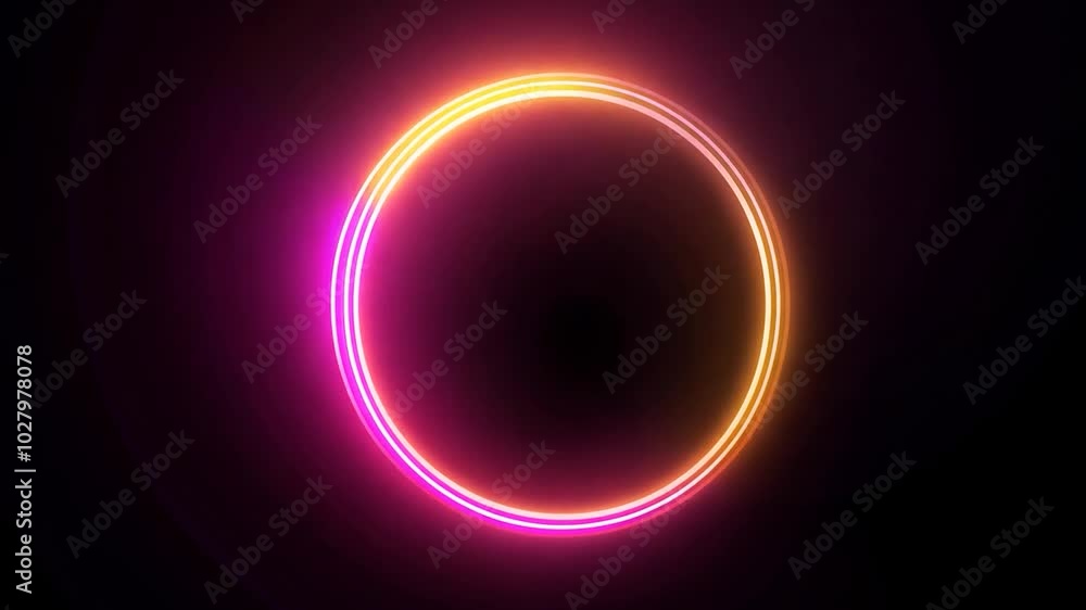 Neon circle is glowing and changing colors on a black background. Useful for many purposes like presentations, video editing, or special effects