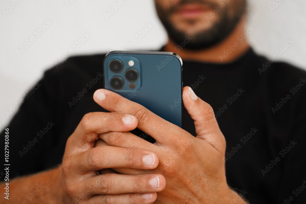 Close-Up of a Hand Holding a Smartphone Close-Up of a Hand Holding a Smartphone