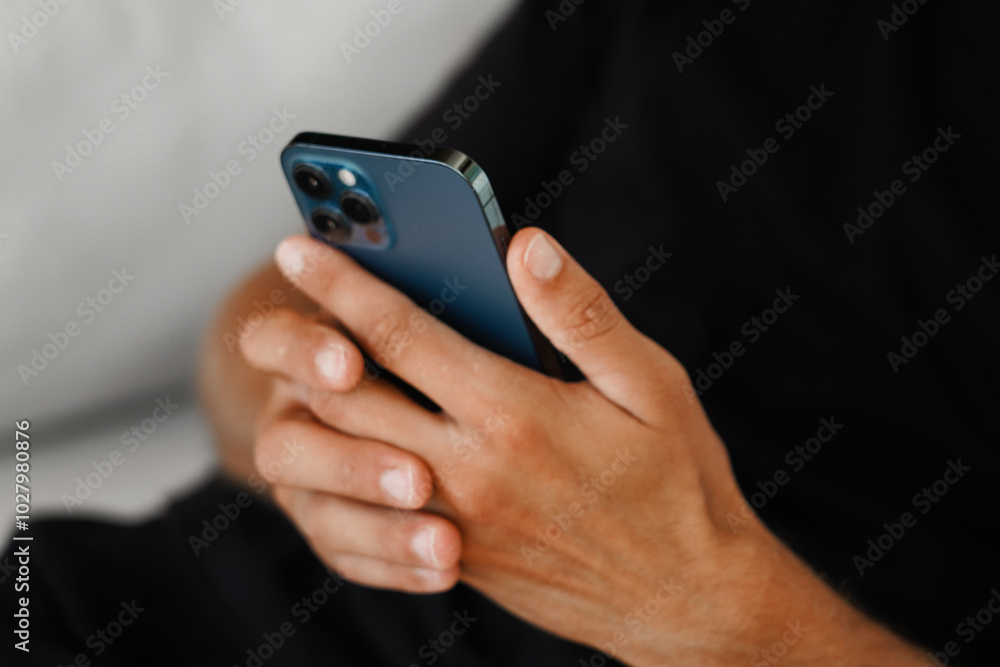 Close-Up of a Hand Holding a Smartphone Close-Up of a Hand Holding a Smartphone