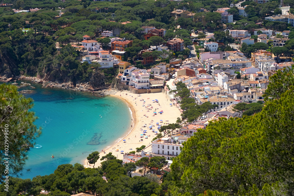 view from the hills to the beautiful bay with beach and promenade of the village Llafranc, Costa Brava, Girona, Catalonia, Spain view from the hills to the beautiful bay with beach and promenade of the village Llafranc, Costa Brava, Girona, Catalonia, Spain