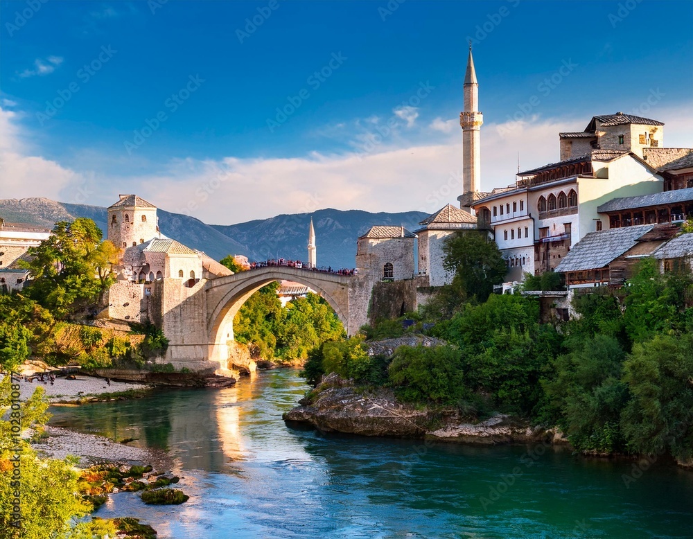 fantastic skyline of mostar with the mostar bridge houses and minarets during sunny day